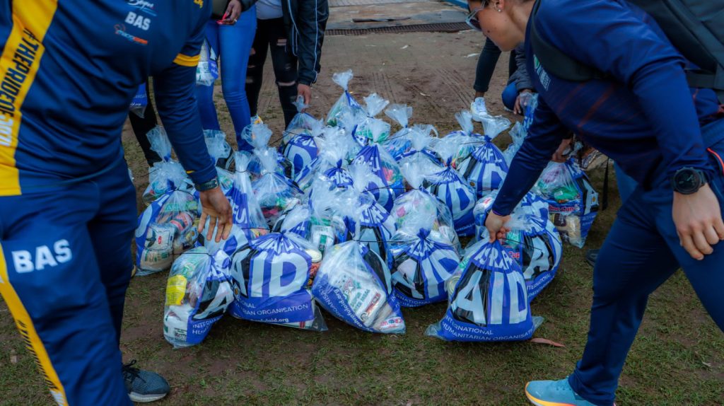 AshrafulAid team handing out grocery bags