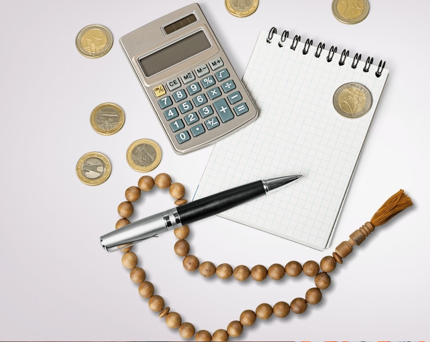 Debt treatment in Hanafi Zakat calculations, with classical full debt deduction, modern distinction between short and long-term debts, and practical rule of deducting only twelve months of installments. Zakat info